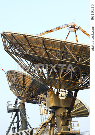 Satellite Communications Dishes on top of TV Station 9619136