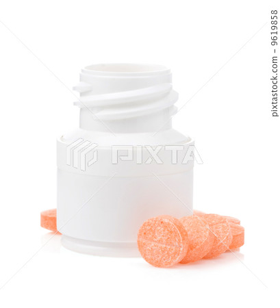 pills and bottle on white 9619858