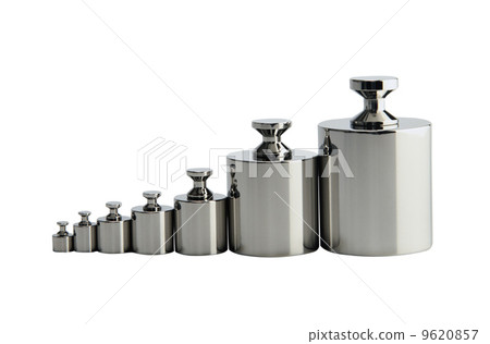 A set of precision weights for a balance scale.  9620857