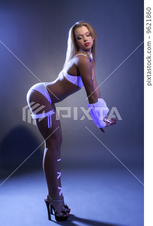 Image of coquettish dancer in erotic costume 9621860