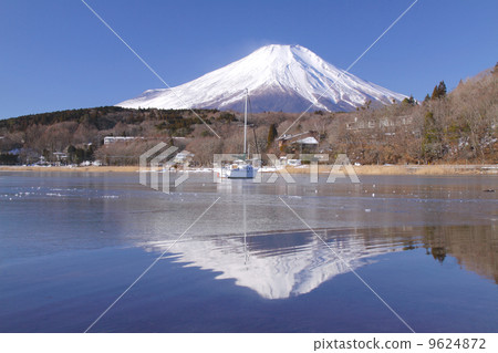 Midwinter inverted Fuji reflected on the lake of freezing Yamanakako, one of Fuji Goko's "World Cultural Heritage" "Fuji-Hakone Izu National Park" 9624872