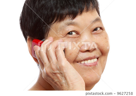 Senior Woman Talking On Mobile Phone 9627258