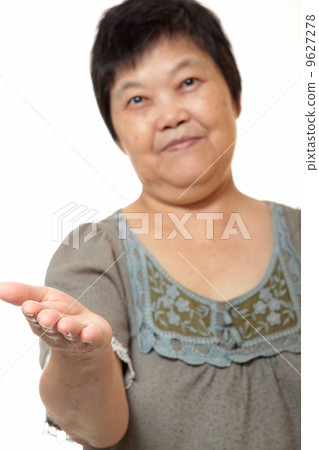 Young Asian woman hand showing blank sign Young Asian woman hand showing blank sign 9627278