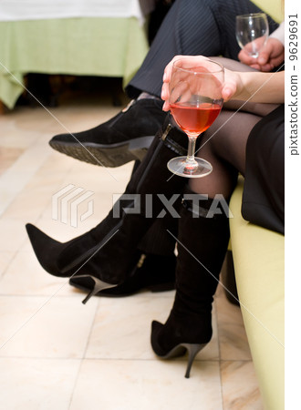glass of wine in female hand 9629691