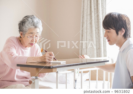 Write a letter Male caregiver watching over older women 9631802