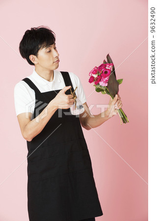 A flower shop giving water to flowers A flower shop giving water to flowers 9632490