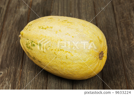Big marrow squash on wooden background. 9633224