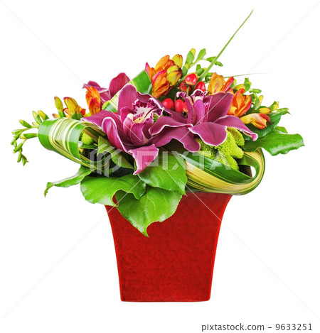 Bouquet from orchids and lilies in red vase isolated on white ba 9633251