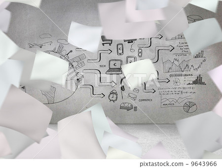 White paper in front of grey wall with graphic 9643966