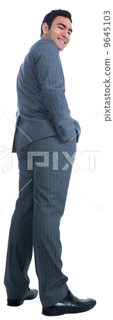 Smiling businessman standing Smiling businessman standing 9645103