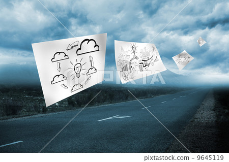 Sheets with graphic over landscape background 9645119