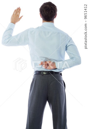 Businessman crossing fingers behind his back Businessman crossing fingers behind his back 9651412