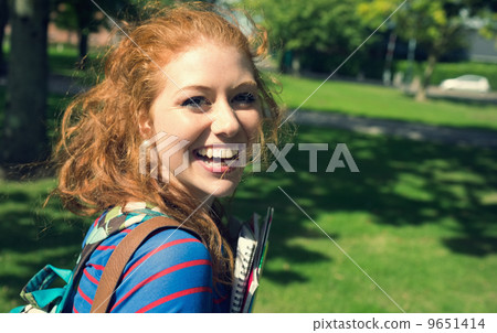 Cheerful student looking at camera 9651414