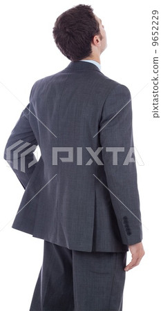 Businessman standing with hand on hip Businessman standing with hand on hip 9652229