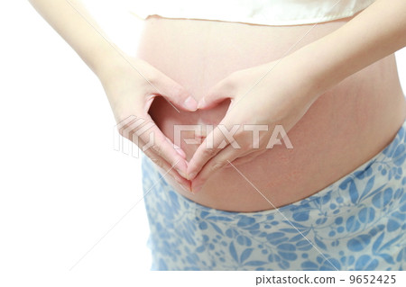 Pregnant woman's stomach 9652425