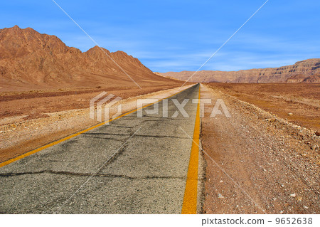Road through red mountains in Timna park, Israel. 9652638
