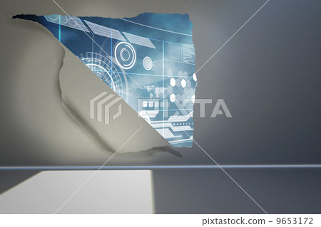 Rip on wall showing technology interface 9653172