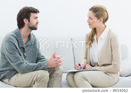 Young man in meeting with a financial adviser Young man in meeting with a financial adviser 9654082