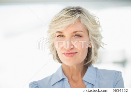 Close-up portrait of a smiling businesswoman Close-up portrait of a smiling businesswoman 9654232