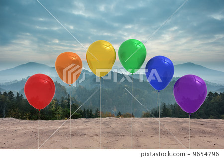 Balloons in front of mountains 9654796