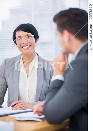 Smartly dressed colleagues in business meeting 9655220