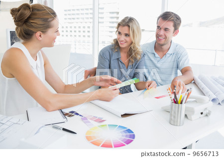 Group of artists working on designs Group of artists working on designs 9656713