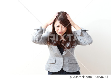 A woman holding a head A woman holding a head 9658761