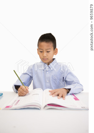 A boy studying 9659879