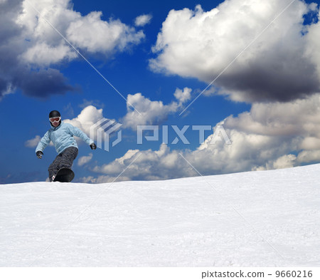 Snowboarder on off-piste slope Snowboarder on off-piste slope 9660216