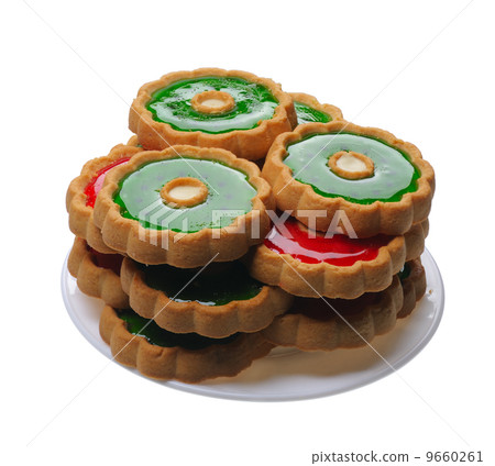 Cookies with red and green jelly on white plate, isolated 9660261