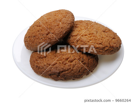 Cookies on a plate, isolated 9660264