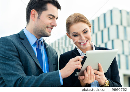 Businesspeople working outdoor Businesspeople working outdoor 9660762