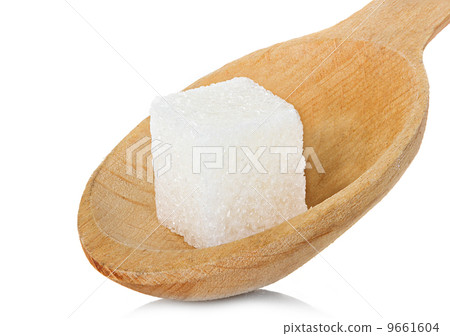 refining sugar cube in spoon 9661604