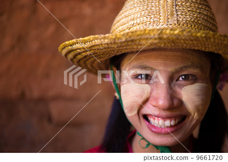 close up myanmar female face with traditional thanaka painting, close up myanmar female face with traditional thanaka painting, 9661720