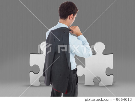 Composite image of businessman holding his jacket Composite image of businessman holding his jacket 9664013