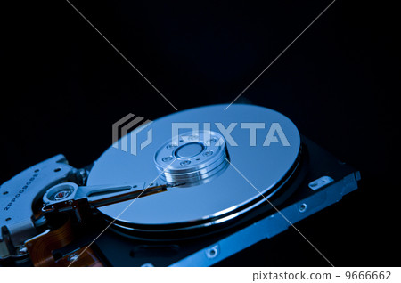 Open hard disk on a black background Open hard disk on a black background 9666662
