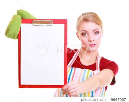 housewife or barista in kitchen apron holds clipboard with empty blank isolated 9667067