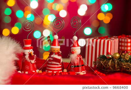 christmas elves, santa and snowman toy with lights background 9668400
