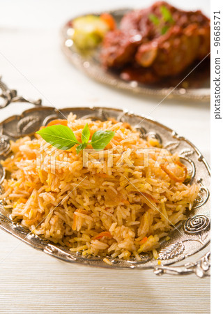 Biryani rice or briyani rice, curry chicken and salad, tradition 9668571