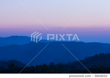 Beautiful twilight sky of mountain view at chiang dao, Thailand 9668692