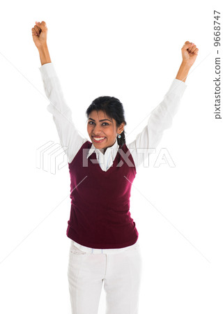 casual indian female celebrating success , full body isolated on 9668747