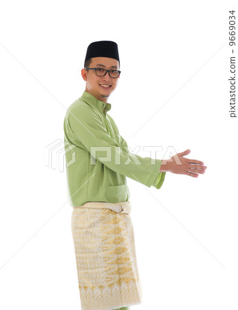 Traditonal Malay man with welcome gesture during ramadan isolate 9669034