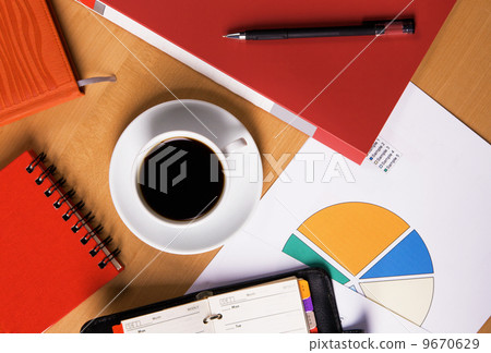 Work-table covered with documents 9670629