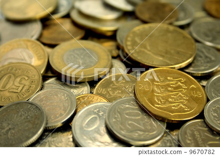 A pile of coins close-up A pile of coins close-up 9670782