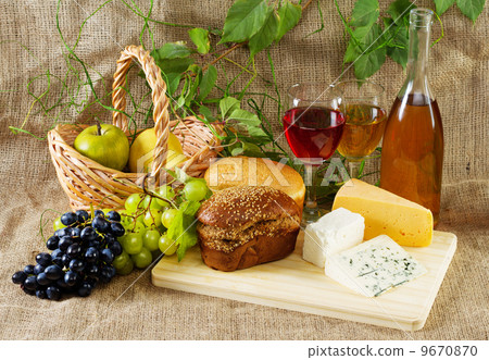 Wine and grapes on vintage background 9670870