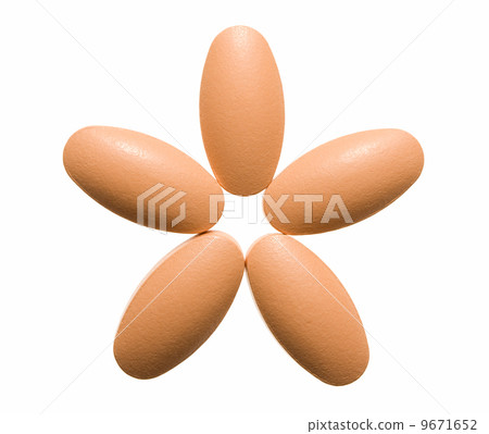 Star of five drug pills on white 9671652