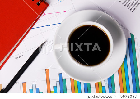 Work-table covered with documents 9672053