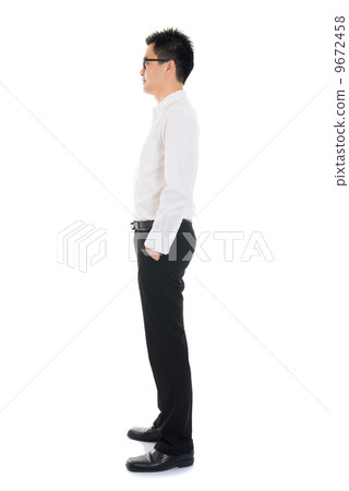 Young Asian business man full body side view... - Stock Photo [9672458