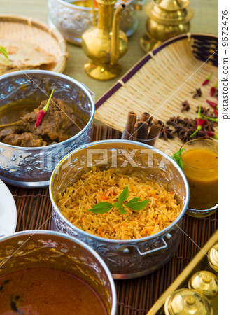 Indian meal with curry and biryani Indian meal with curry and biryani 9672476