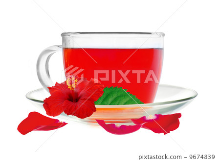 Glass cup hibiscus tea with hibiscus flower and petals Glass cup hibiscus tea with hibiscus flower and petals 9674839